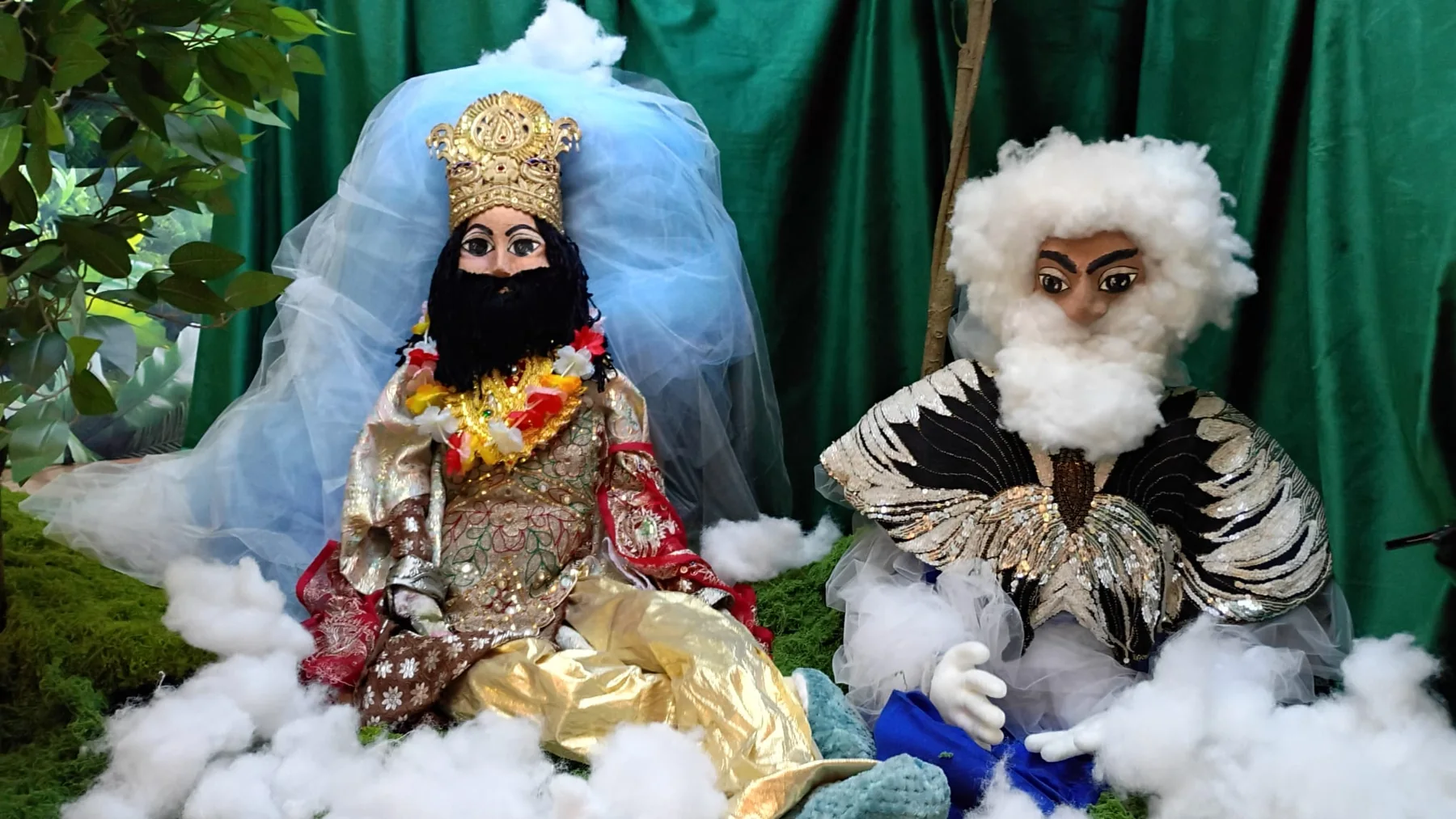 Handcrafted characters Indra and the storm clouds